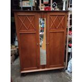 Vintage wardrobe with compass feet and central mirror Scandinavian style design