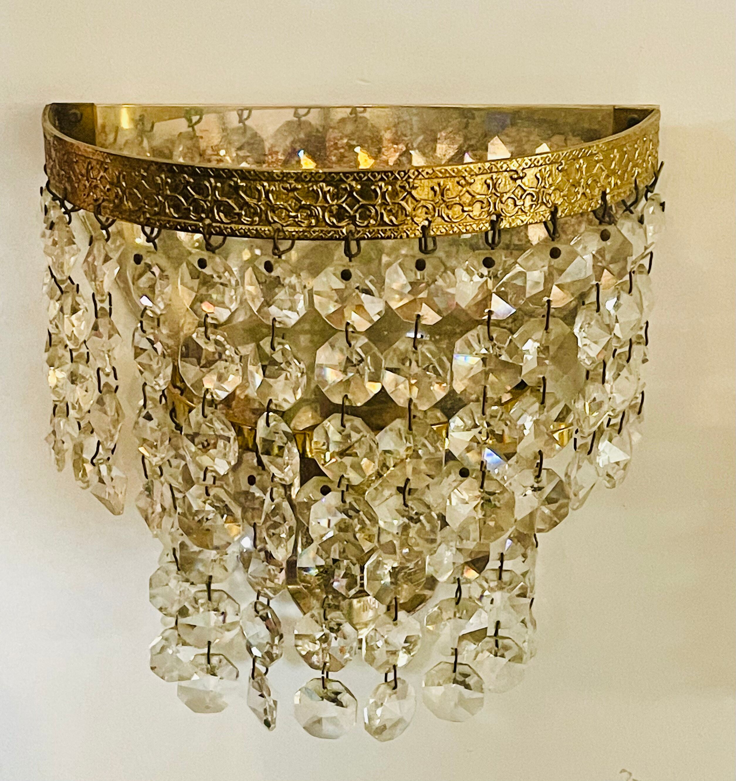 Pair of brass sconces and tassels