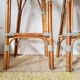 Pair of vintage Gatti bar stools in two-tone rattan and caning.