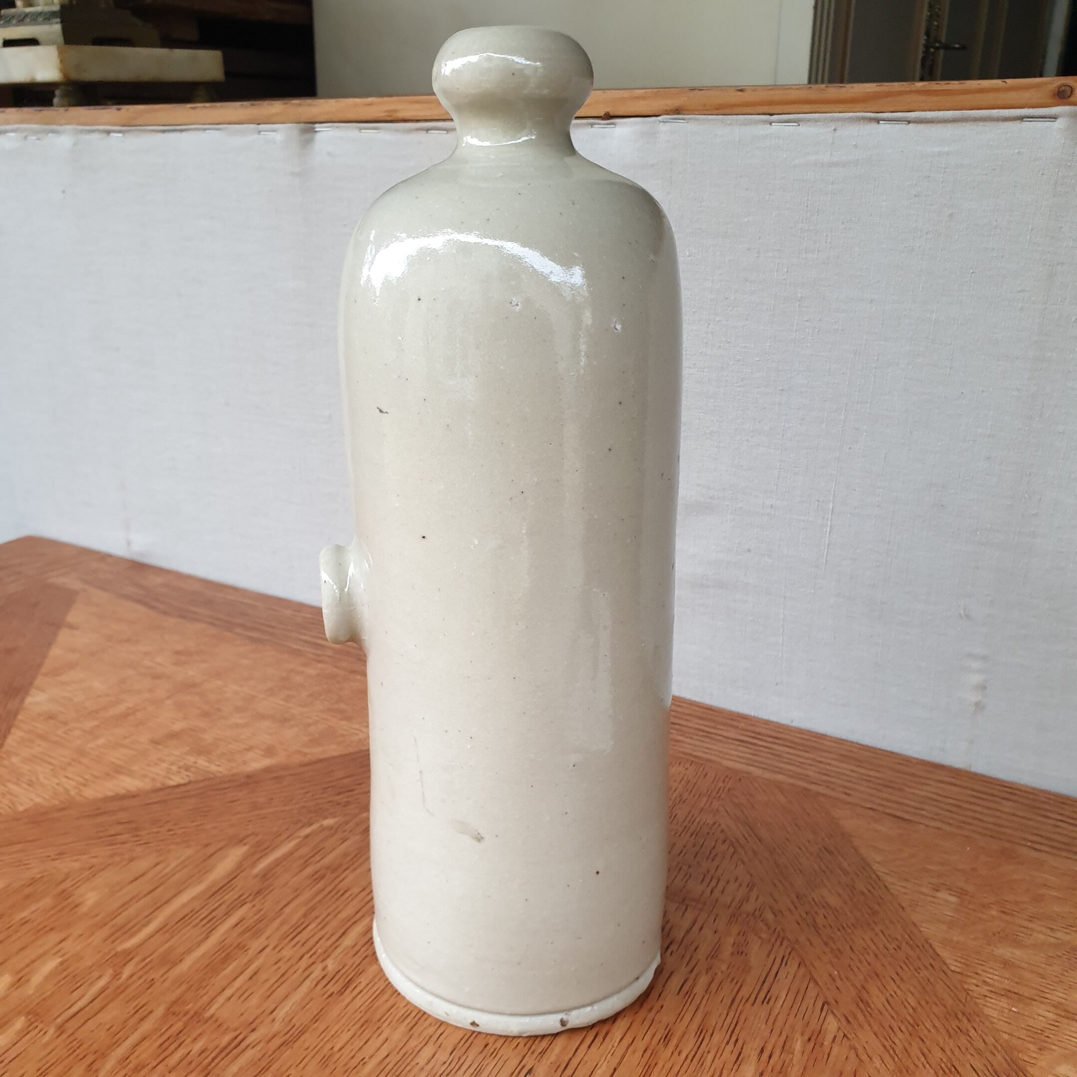 Vintage bottle in enamelled sleet