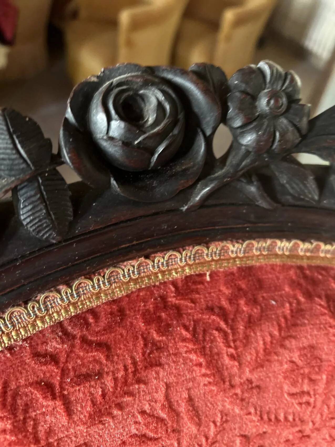 Napoleon III medallion armchair in carved wood and red velvet.