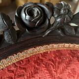 Napoleon III medallion armchair in carved wood and red velvet.