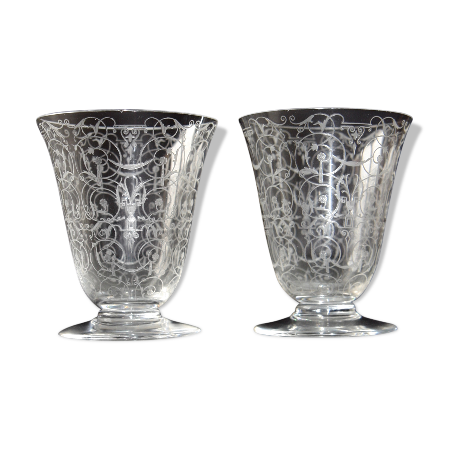 Two Baccarat glasses model "Michelangelo" in engraved crystal.