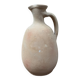 Unfired clay pitcher