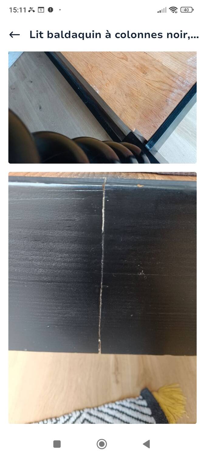 Black, solid wood four-poster bed, made by a craftsman in Mexico