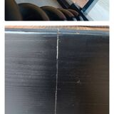 Black, solid wood four-poster bed, made by a craftsman in Mexico