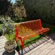 Orange pierced sheet metal bench