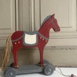 Antique toy, small horse on wheels