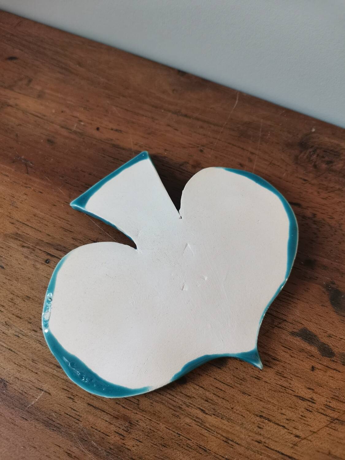 Vintage bowl in the shape of a slightly speckled blue enamelled bird