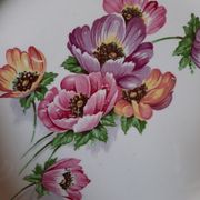 Flat antique earthenware plates with gilded edges