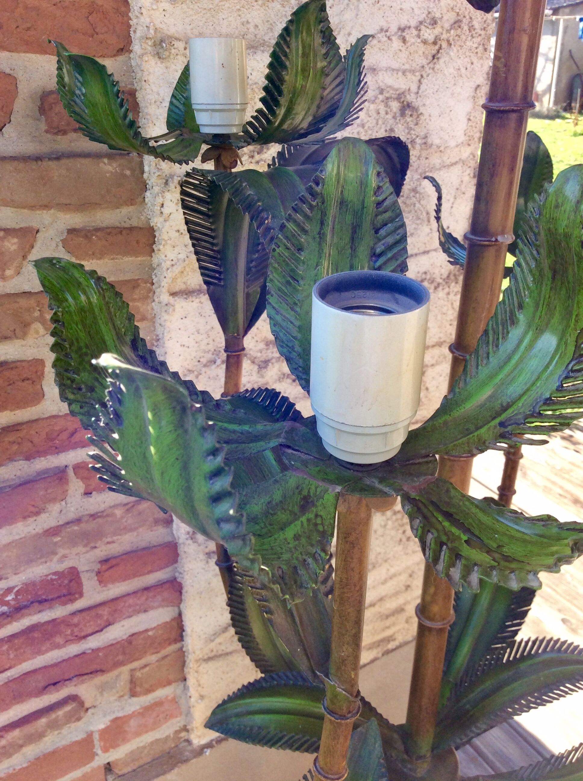 Vintage palm leaf lampposts