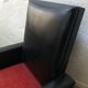 Vintage armchair in red and black skaï