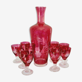 10 glasses and carafe with alcohol or liquor