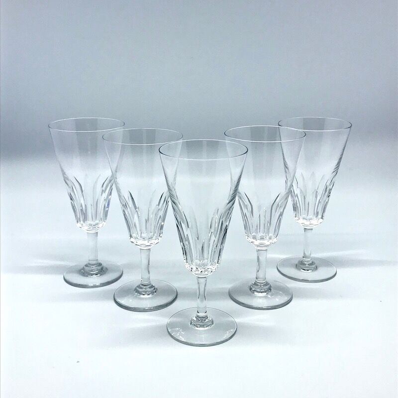 Five Baccarat champagne flutes
