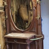 Coat rack with oval mirror