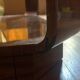 Varnished coffee table in exotic wood