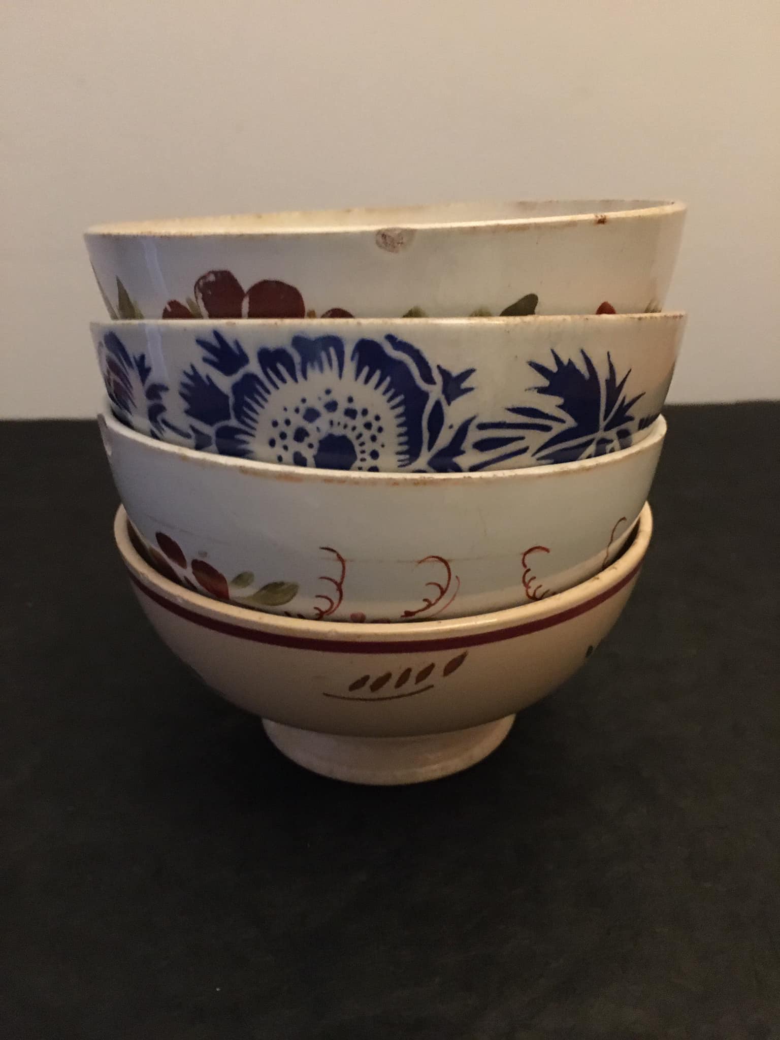 4 antique earthenware bowls with different patterns