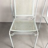 Pair of mid century perforated steel stacking chairs