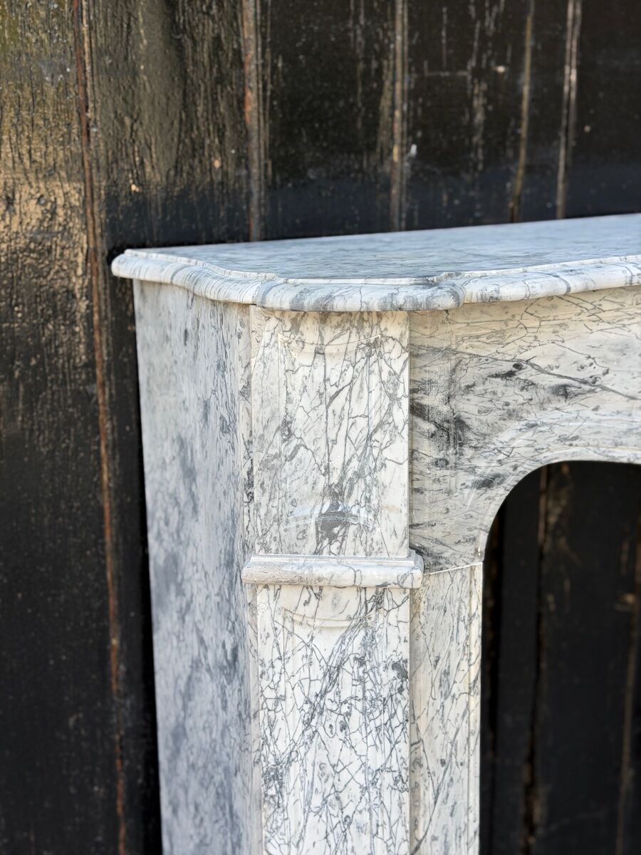 Pompadour model fireplace in blue Turquin marble from around 1880, one pair available.