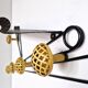 Black and yellow wall coat rack, France