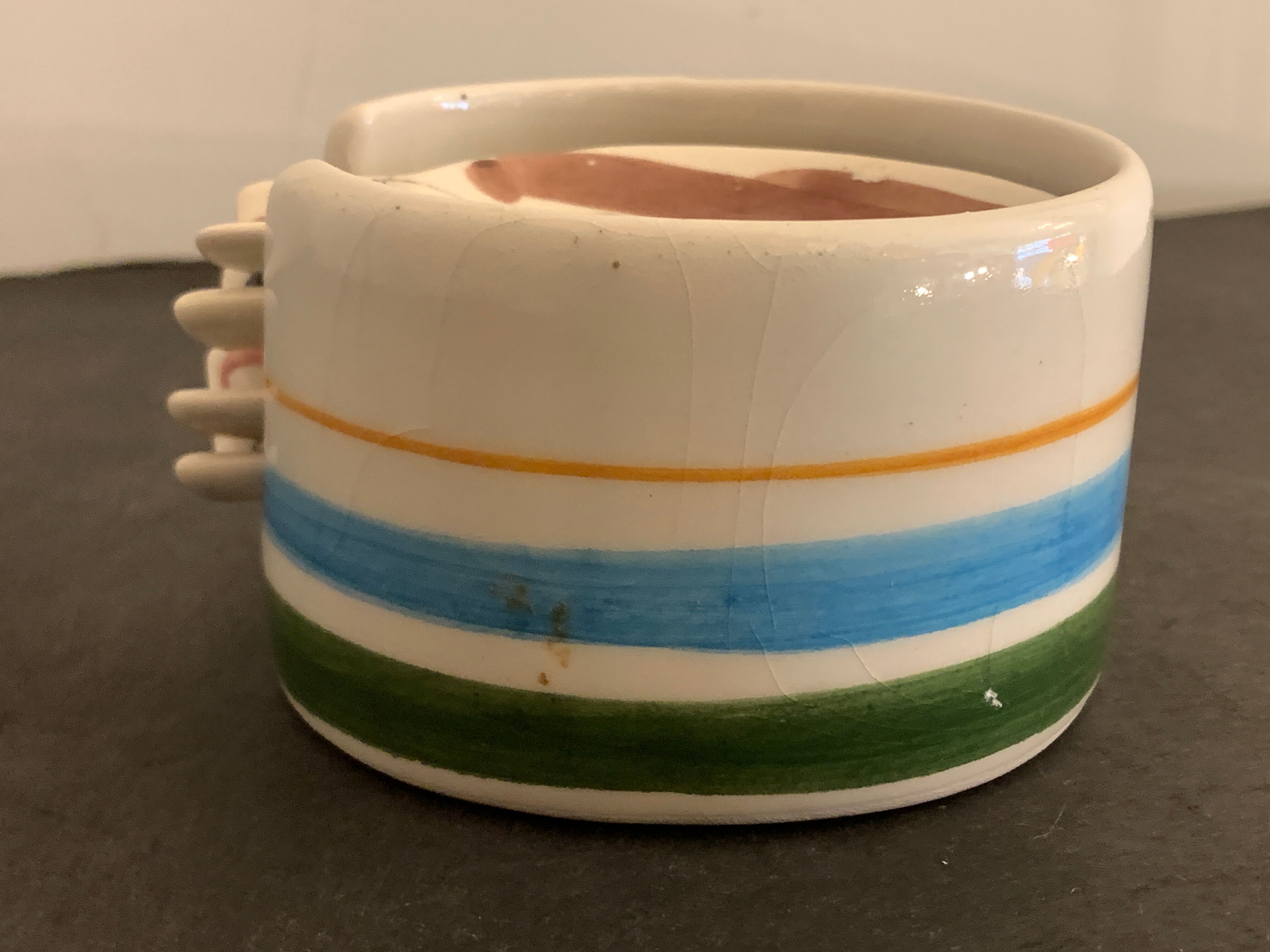 4 individual Italian ceramic stackable ashtrays with women's faces