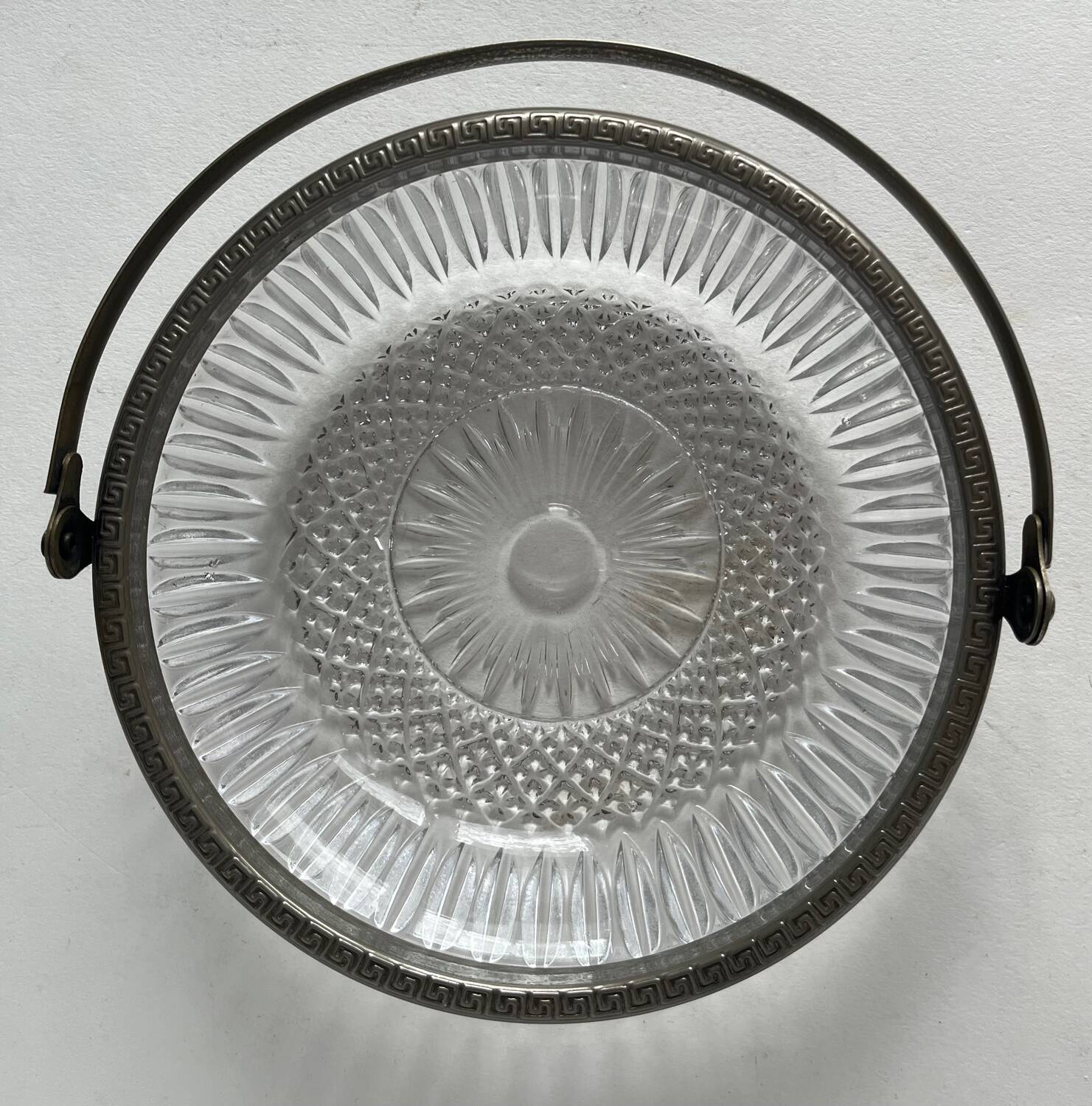 Antique glass cup with metal frame