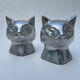 Pair of designer cat head bookends