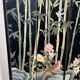 Chinese lacquered screen with decorations of birds and bamboo. Chinese work. Around 1950.
