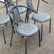 4 vintage bistro chairs in steel and grey leather from the 1980s.