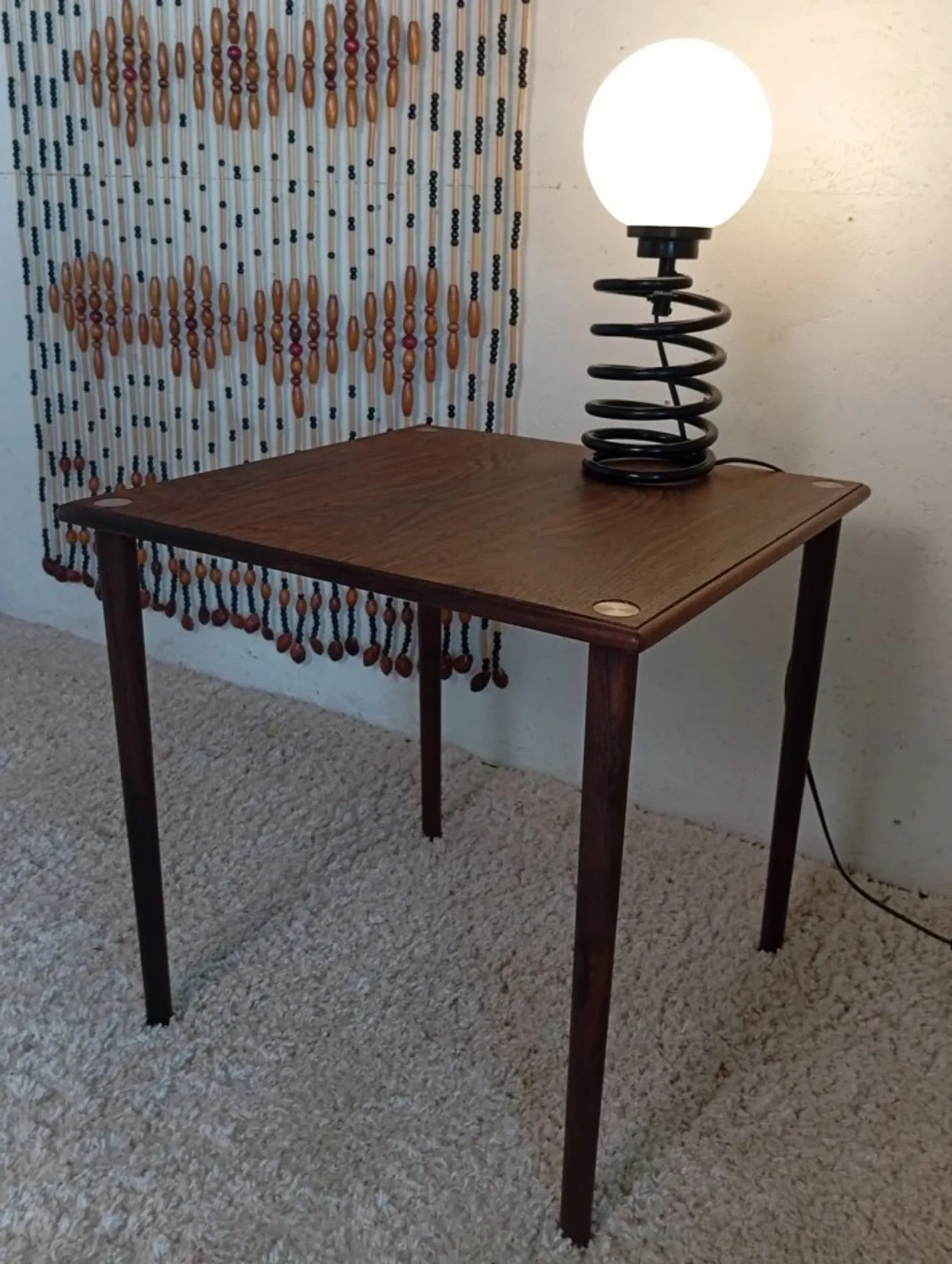 Spring lamp from the 1980s, design by Ingo Maurer.