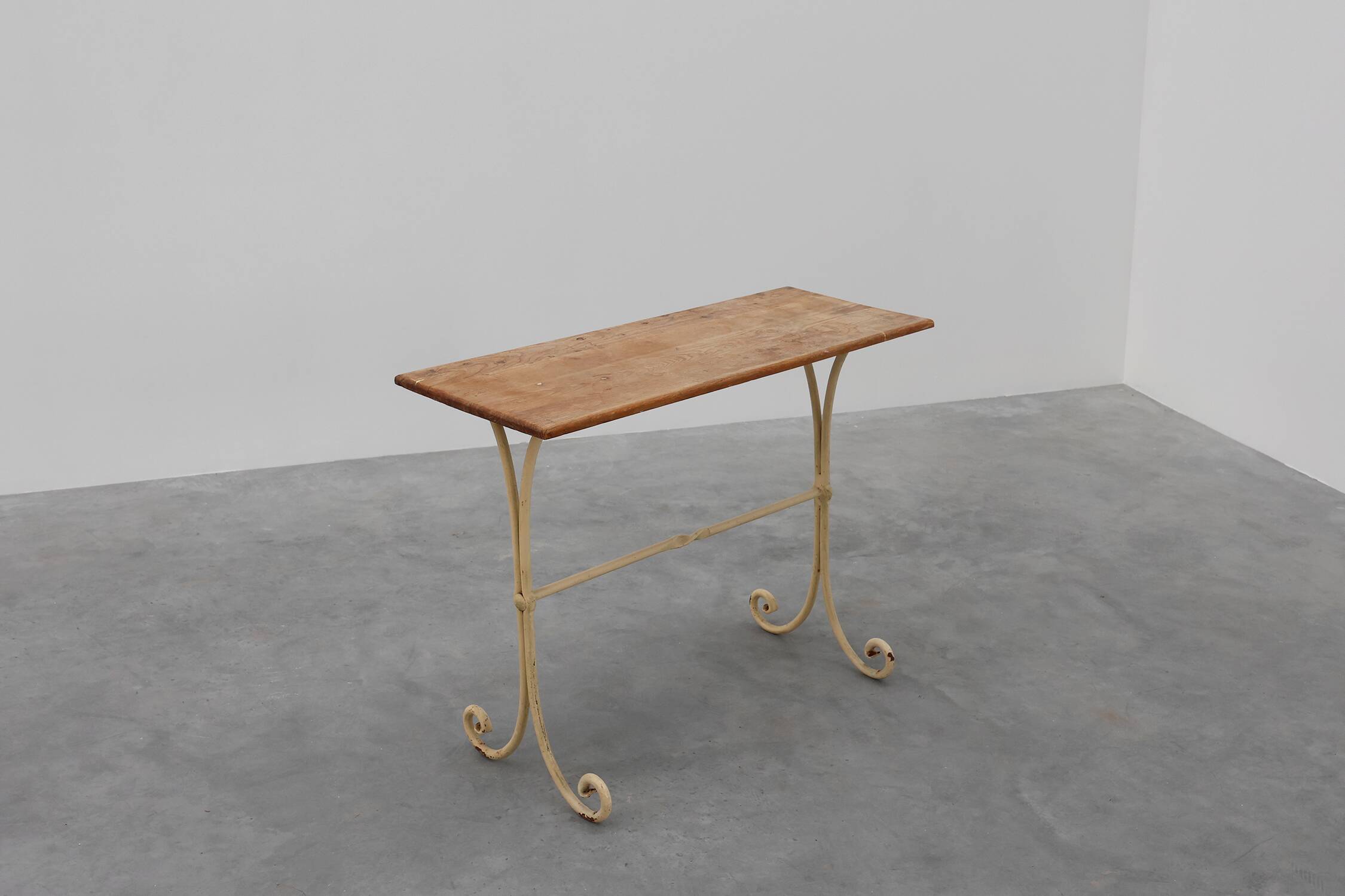 20th century French bistro table with cast iron base and oak top