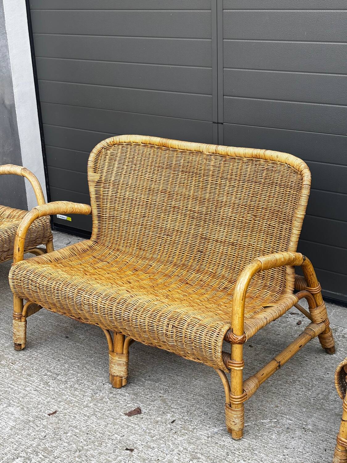 Vintage rattan garden furniture – complete set with sofa and armchairs.