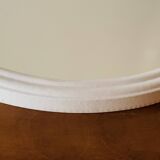 Oval mirror in vintage enameled white cast iron