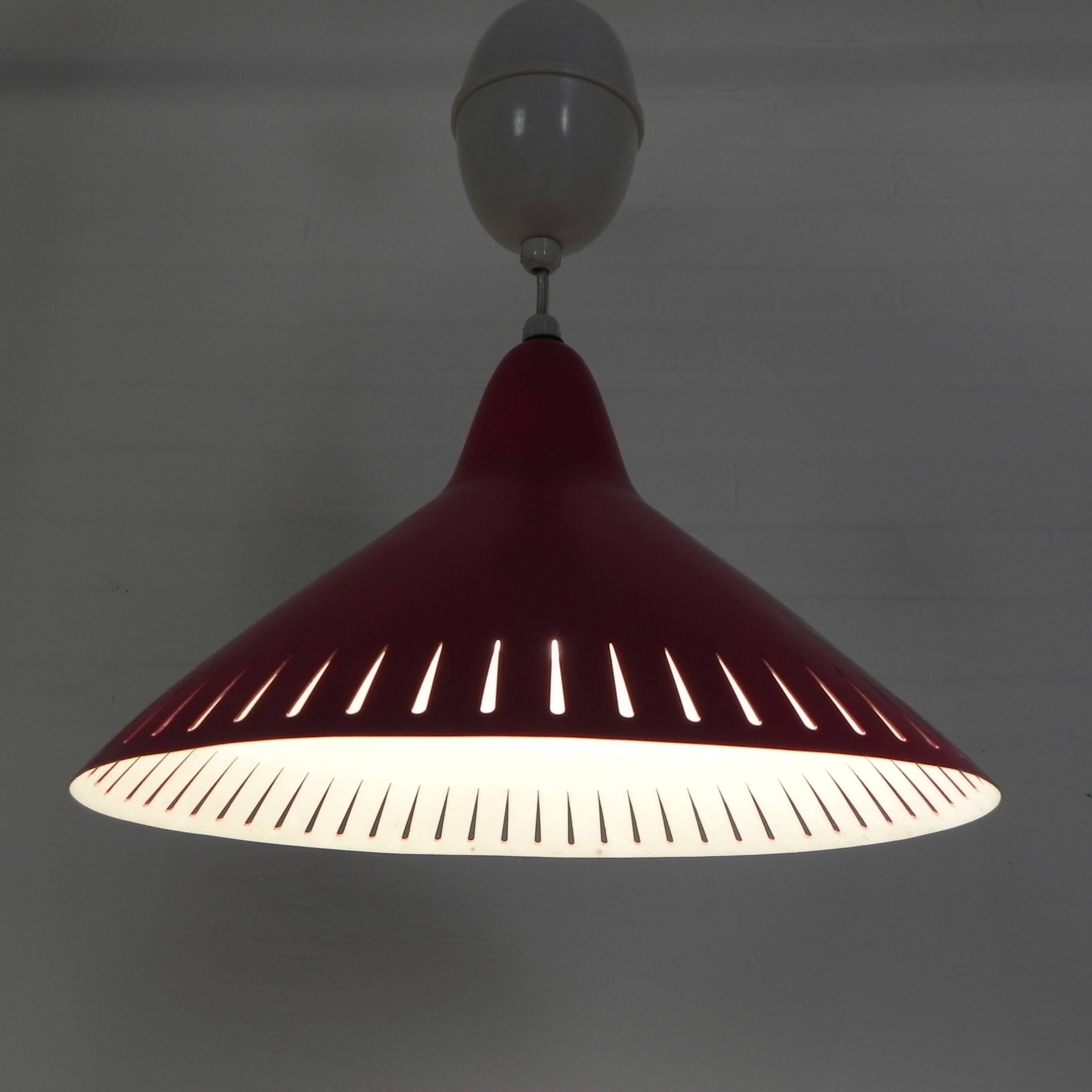 Hala suspension by H. Busquet with red shade and winding system, 1950s.