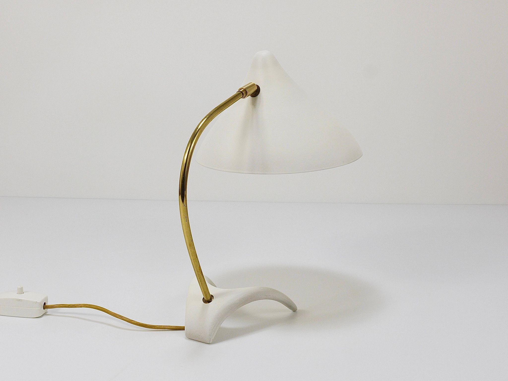 White brass desk or table lamp in the Louis Kalff style from the 1950s.