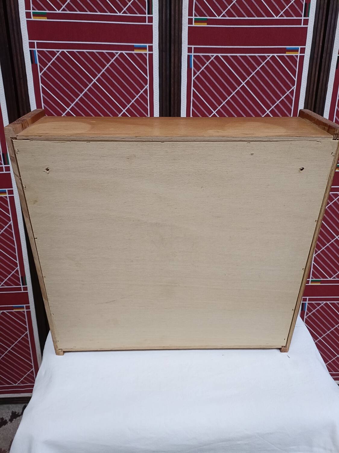 Small wall-mounted bathroom cabinet with vintage mirror doors