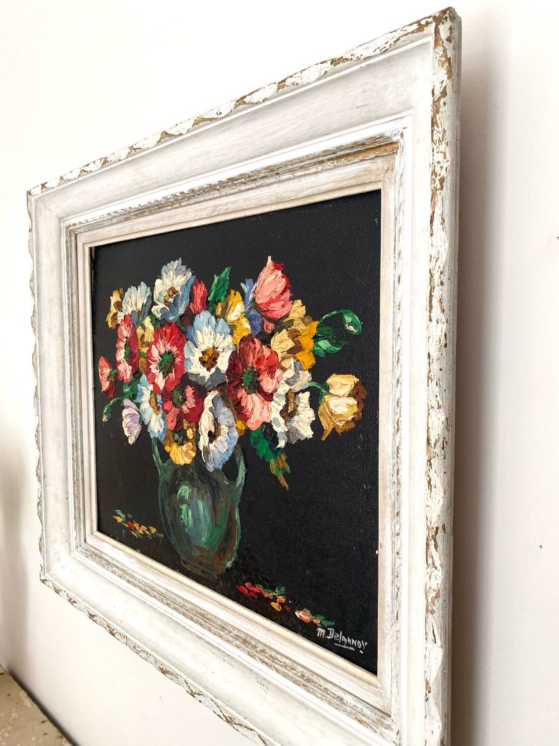 Old oil on canvas depicting a bouquet of flowers