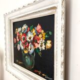 Old oil on canvas depicting a bouquet of flowers