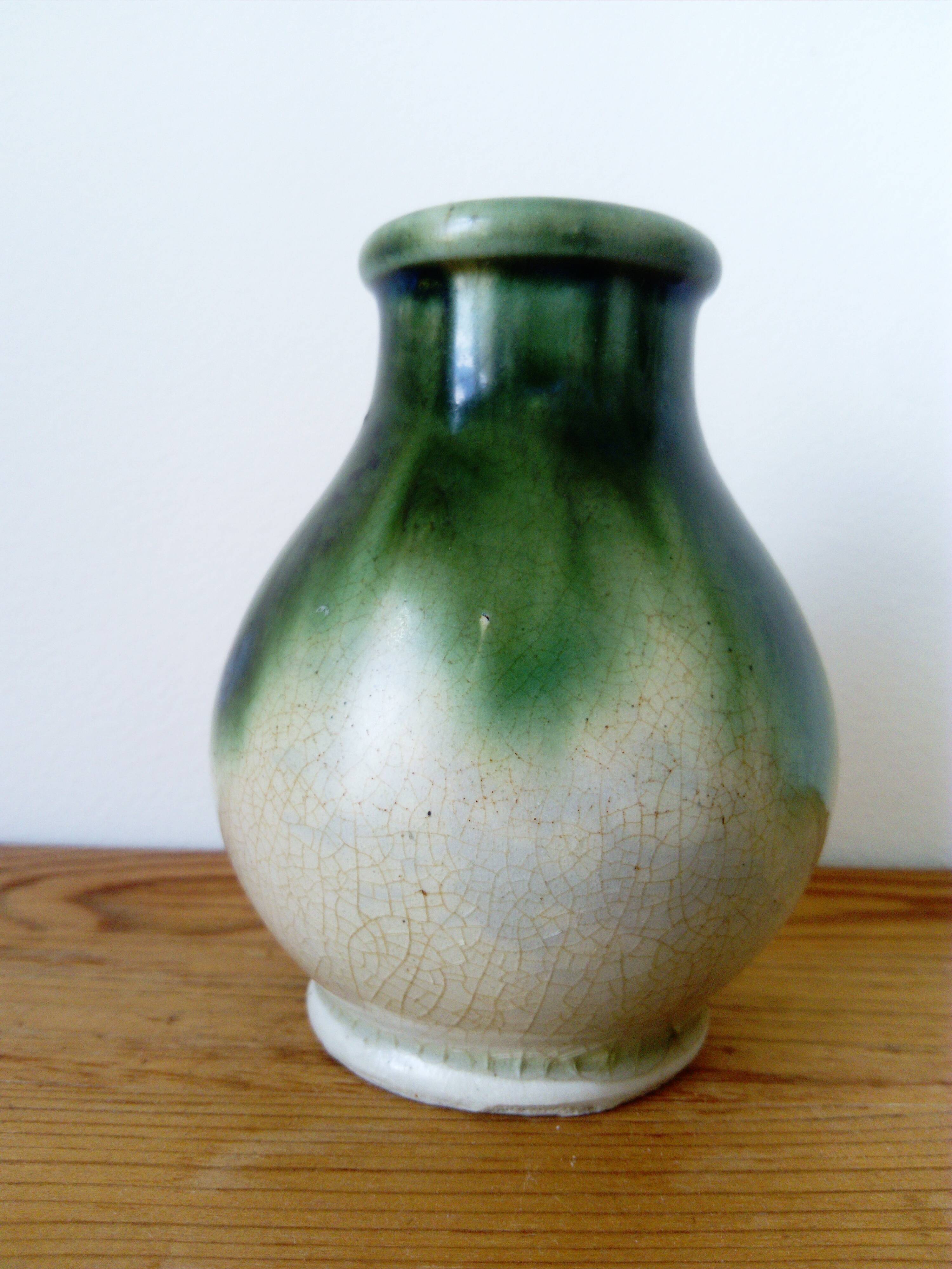 small green and cream glazed ceramic vase