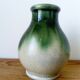 small green and cream glazed ceramic vase