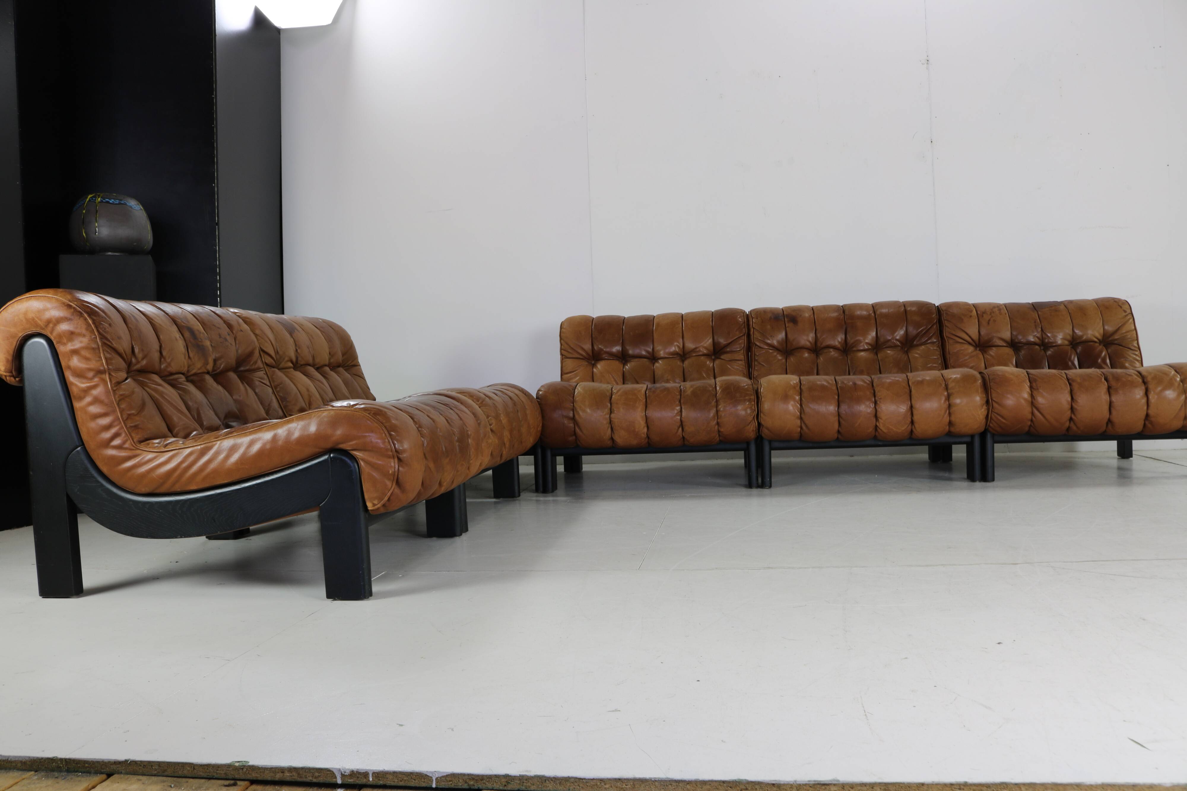 70s living room set in cognac brown leather with black wenge wood frame