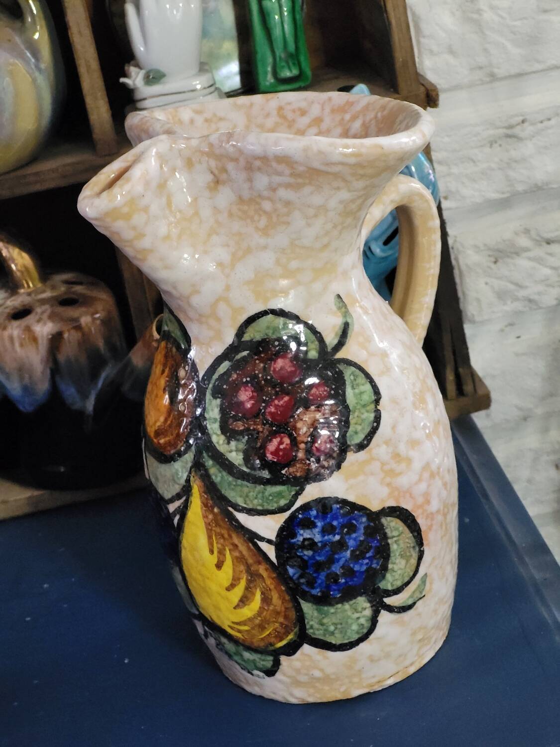 Pitcher decorated with fruit