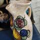 Pitcher decorated with fruit