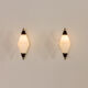 Paire de lampes murales italiennes du milieu du siècle attribuées à Stilnovo, années 1960.