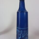 three blue bottles by Salvador Dali for Rosso Antico