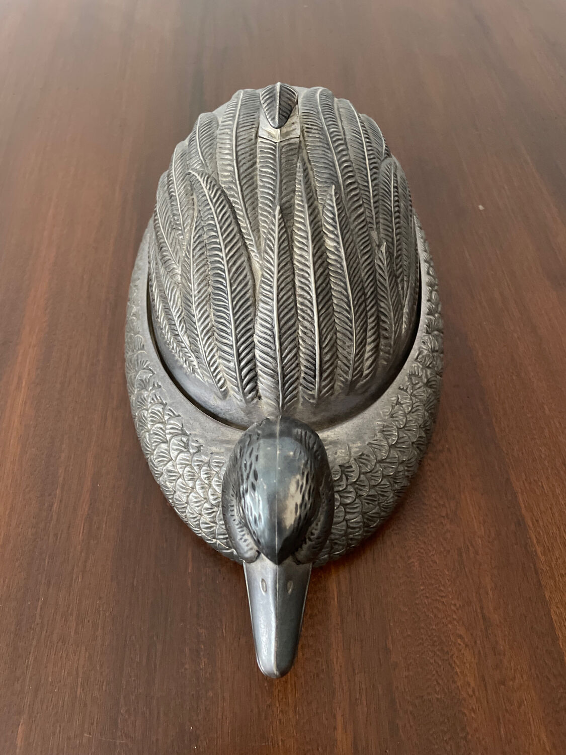 Serving dish with bell in silver metal shape duck