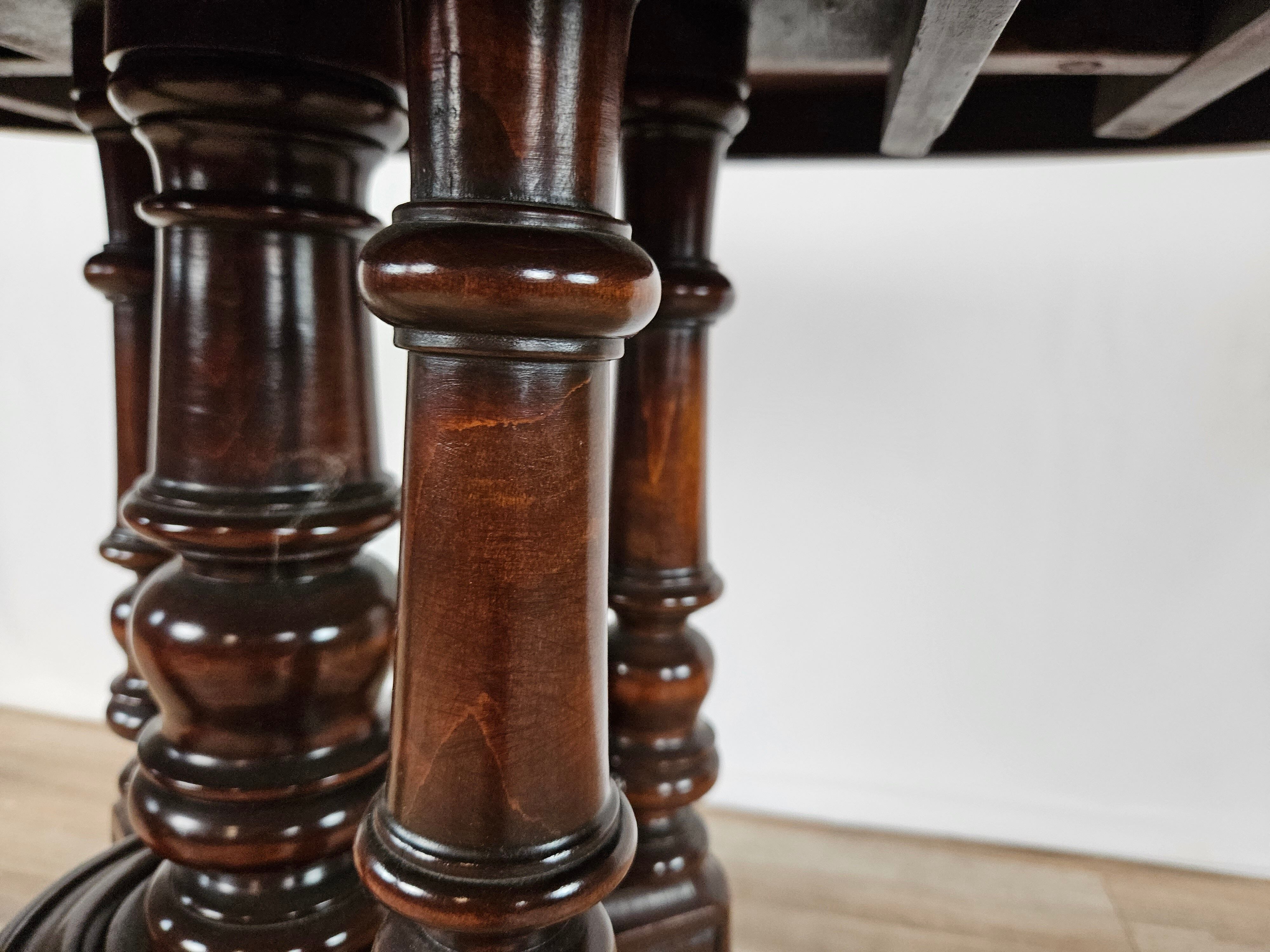 Coffee table in walnut with maple inlays and wheels