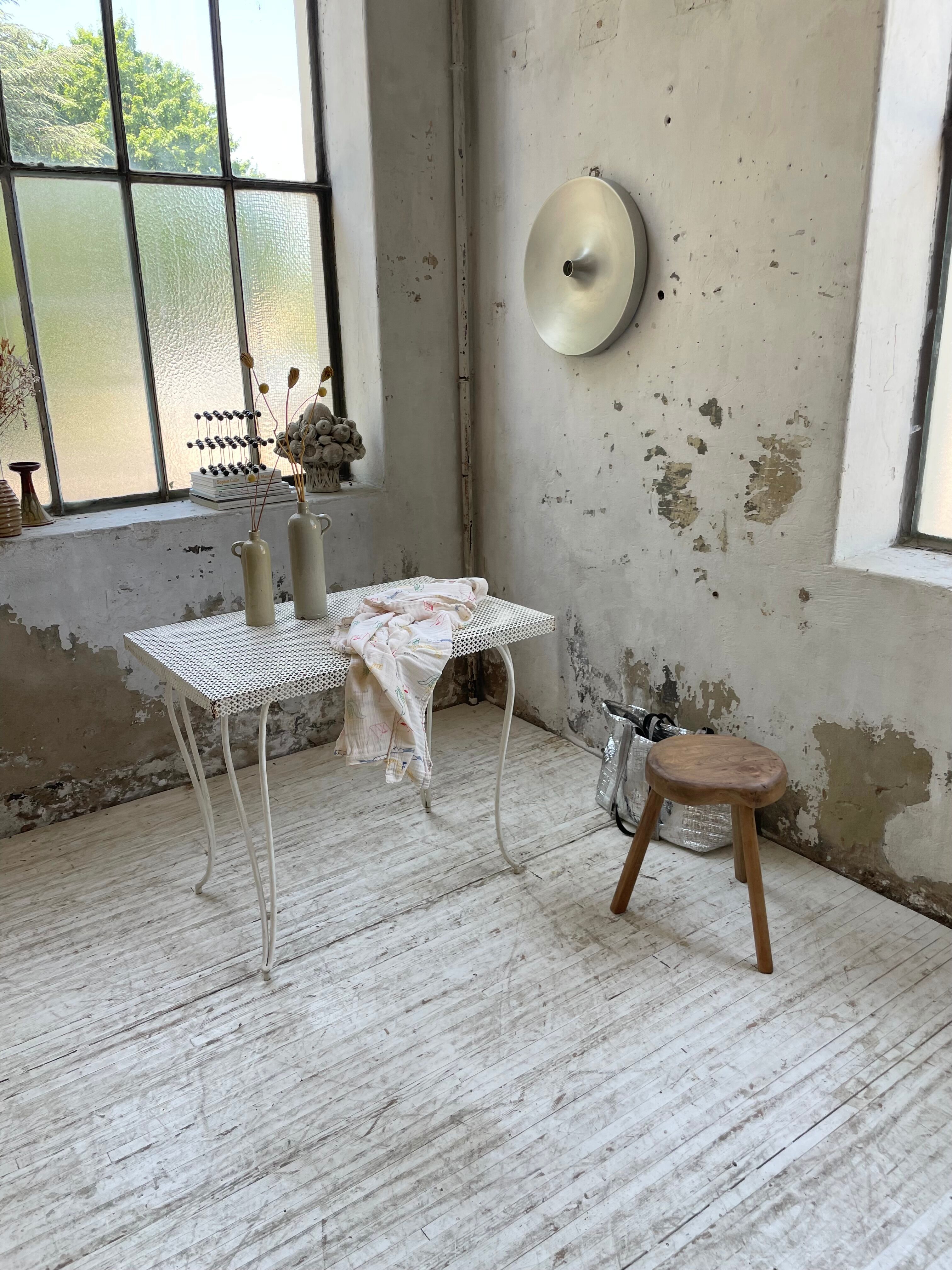 Perforated garden dining table