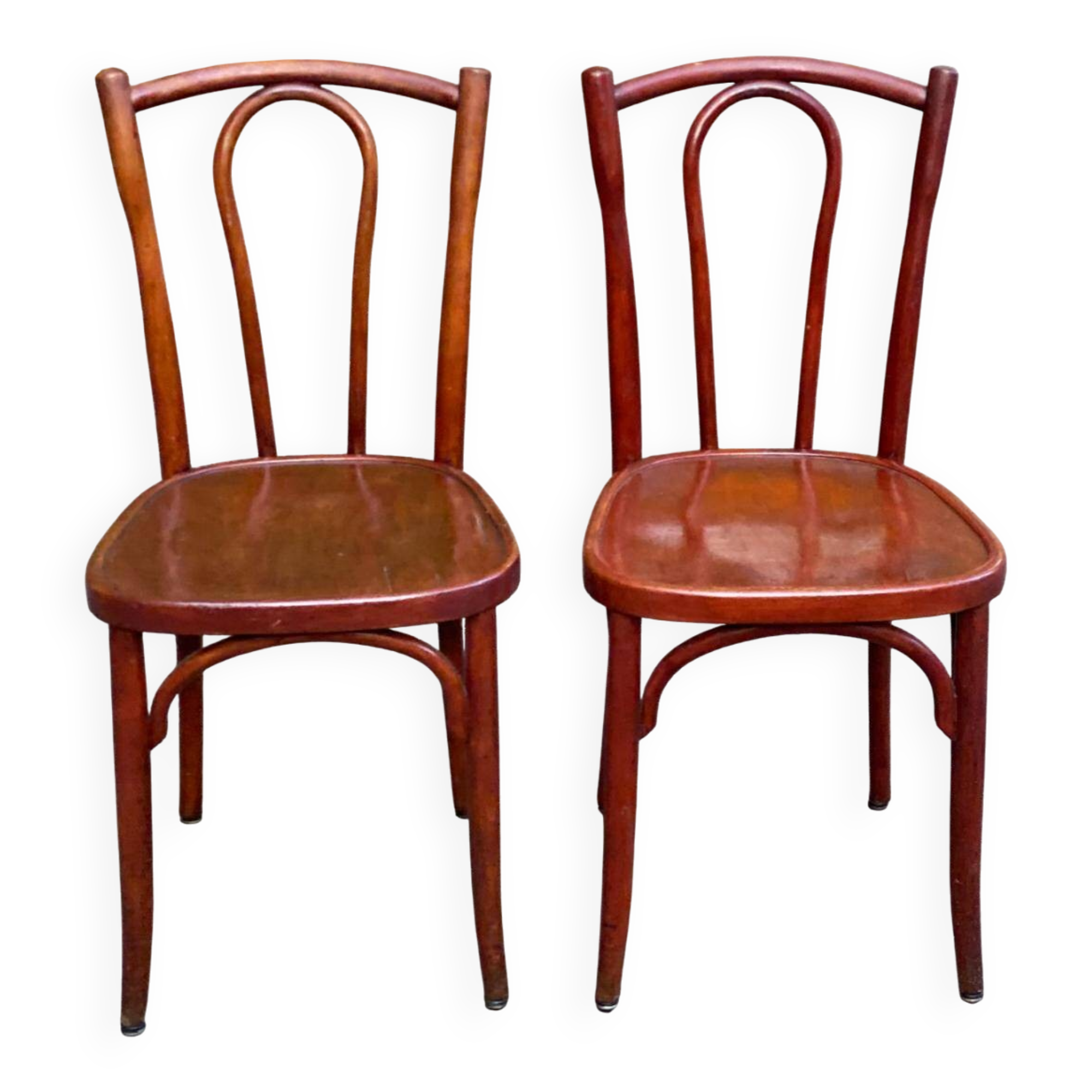 2 curved solid wood bistro chairs in Bordeaux.