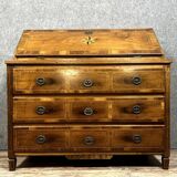 Louis XVI period chest of drawers in burr walnut with plum wood marquetry on all sides